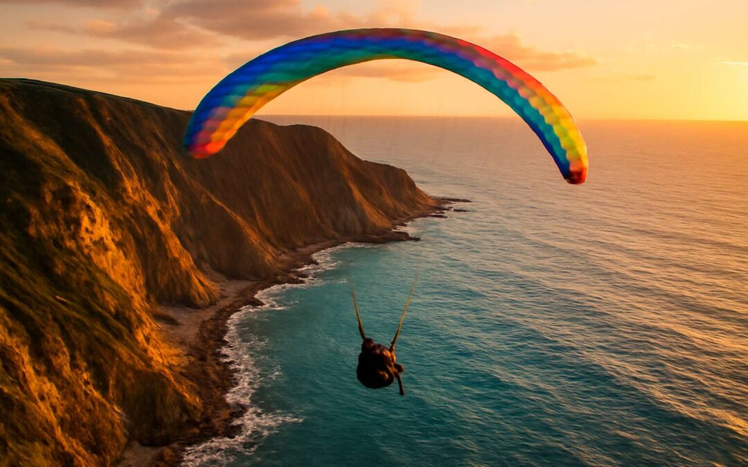 Experience paragliding 961: Sky-high thrills and breathtaking coastal views.